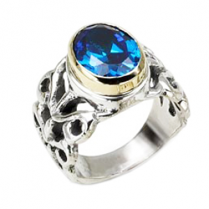 Sterling Silver Ring with Carvings and Blue Topaz Stone Joyería Judía